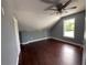 Bedroom with ceiling fan, window, dark wood floors and light-grey paint at 5191 Nw Emory Nw St, Covington, GA 30014