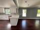 Open living space with wood floors, ample natural light, and modern finishes at 5191 Nw Emory Nw St, Covington, GA 30014