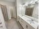 Modern bathroom with a double vanity, a glass shower, and clean, bright finishes at 108 Hickory Run, Canton, GA 30115