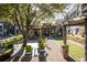 Inviting community featuring lounge areas, lush green space, and a cafe for relaxing and socializing with neighbors at 1210 Mayfield Rd, Milton, GA 30009
