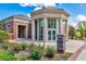 Exterior view of Alpharetta Library, featuring brick facade, grand columns, and inviting entrance at 1210 Mayfield Rd, Milton, GA 30009