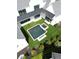 Aerial view of modern pool and spa surrounded by artificial turf for low maintenance backyard enjoyment at 1210 Mayfield Rd, Milton, GA 30009