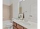 Cozy bathroom with a single vanity, tiled shower and tub, and a neutral color palette at 1345 Hilltop Overlook Dr, Marietta, GA 30062