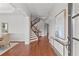 Elegant foyer featuring hardwood floors, a staircase with iron spindles, and classic trim at 1345 Hilltop Overlook Dr, Marietta, GA 30062