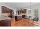 Gourmet kitchen with dark cabinetry, granite counters, and stainless appliances, perfect for culinary enthusiasts at 1345 Hilltop Overlook Dr, Marietta, GA 30062