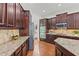 Well-appointed kitchen featuring granite countertops, stainless steel appliances, and ample cabinet space at 1345 Hilltop Overlook Dr, Marietta, GA 30062
