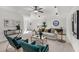 The living room features neutral carpeting, modern trim detail, and plentiful furniture seating at 1345 Hilltop Overlook Dr, Marietta, GA 30062
