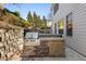 Outdoor kitchen featuring stone construction with a built-in grill and countertop space, perfect for summer cooking at 1345 Hilltop Overlook Dr, Marietta, GA 30062