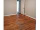 Bedroom with hardwood floors, neutral walls, and bright natural light at 732 Vinson Sw Pl, Atlanta, GA 30315
