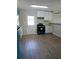 Spacious kitchen featuring new appliances, updated cabinets, and modern flooring at 732 Vinson Sw Pl, Atlanta, GA 30315