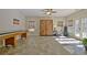 Finished bonus room with natural light, and a decorative murphy bed behind custom barn doors at 209 Wynnward Way, Sharpsburg, GA 30277