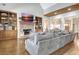 Comfortable living room with stone fireplace, built-in shelves, and hardwood flooring at 209 Wynnward Way, Sharpsburg, GA 30277