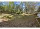 A large, grassy backyard is ready for your favorite outdoor activities at 3680 Larkspur Ter, Decatur, GA 30032
