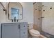 A bathroom featuring a stylish vanity, new sink and mirror, and a walk-in shower at 3680 Larkspur Ter, Decatur, GA 30032