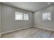Light-filled bedroom featuring hardwood floors, neutral colors, and inviting natural light at 3680 Larkspur Ter, Decatur, GA 30032