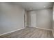 Clean bedroom featuring hardwood floors, neutral colors, with recessed lighting at 3680 Larkspur Ter, Decatur, GA 30032