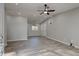 Large living room with sleek floors, vaulted ceiling, ceiling fan and neutral colors at 3680 Larkspur Ter, Decatur, GA 30032