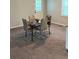 Inviting dining area featuring a modern table with stylish chairs and natural light at 3990 N Quail Dr, Douglasville, GA 30135
