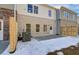 Back exterior view showing a small patio, fenced yard, and an air conditioning unit at 4525 Twinberry Dr, Powder Springs, GA 30127