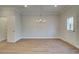 Bright dining area features wood flooring and modern lighting at 4525 Twinberry Dr, Powder Springs, GA 30127