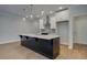 Beautiful kitchen featuring a large island with pendant lighting and stainless steel appliances at 4525 Twinberry Dr, Powder Springs, GA 30127