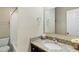 Bathroom featuring a sink, granite counters, and a shower/tub combo at 6980 Roswell Rd # G3, Atlanta, GA 30328