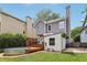 Backyard featuring a stock tank pool, wooden deck, and storage shed at 120 Candler Oaks Ln, Decatur, GA 30030