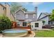 Backyard with stock tank pool, deck, and storage shed, creating a perfect outdoor retreat at 120 Candler Oaks Ln, Decatur, GA 30030