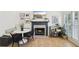 Cozy dining area with built-in seating, fireplace, and television at 120 Candler Oaks Ln, Decatur, GA 30030