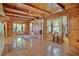 Bright and airy living room featuring wood paneled walls, hardwood floors, and plenty of natural light at 154 Knucklesville Rd, Rydal, GA 30171