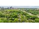 An aerial view showcases highway access in a tree filled neighborhood of Atlanta, Georgia at 1740 Doncaster Ne Dr, Atlanta, GA 30309