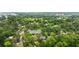 Aerial view showcasing 1740 Doncaster Dr NE homes surrounded by lush trees and Ansley Gold Club at 1740 Doncaster Ne Dr, Atlanta, GA 30309