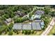 Aerial view showcasing Ansley Golf Club's pool and tennis amenities within a lush landscape at 1740 Doncaster Ne Dr, Atlanta, GA 30309