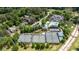 An aerial shot captures the Ansley Golf Club featuring pools, tennis courts, and manicured greens at 1740 Doncaster Ne Dr, Atlanta, GA 30309