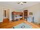 Bedroom with a bunk bed and hardwood floors offering ample space and a cozy ambiance at 1740 Doncaster Ne Dr, Atlanta, GA 30309