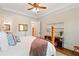 Comfortable bedroom featuring tray ceiling, wood flooring, natural light and ceiling fan at 1740 Doncaster Ne Dr, Atlanta, GA 30309