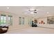 Spacious bonus room with bright windows and built in shelves and cabinets at 1740 Doncaster Ne Dr, Atlanta, GA 30309