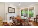 Dining room with fireplace, hardwood floors, natural light and traditional decor at 1740 Doncaster Ne Dr, Atlanta, GA 30309
