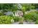 Stunning two-story home with manicured lawn, surrounded by mature trees for added privacy at 1740 Doncaster Ne Dr, Atlanta, GA 30309