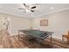 Game room featuring a ping pong table, hardwood floors, and neutral wall colors at 1740 Doncaster Ne Dr, Atlanta, GA 30309
