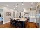 Spacious kitchen with a large granite island, stainless steel appliances, and custom cabinetry at 1740 Doncaster Ne Dr, Atlanta, GA 30309