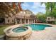 Backyard pool and spa with an amazing brick home and lots of room to play at 1740 Doncaster Ne Dr, Atlanta, GA 30309