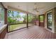 Relaxing screened-in porch with views of the backyard at 1740 Doncaster Ne Dr, Atlanta, GA 30309