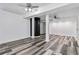 This finished basement features unique wood-look floors, white trim, and recessed lighting at 339 Diane Se Dr, Smyrna, GA 30082