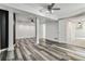 This finished basement features unique wood-look floors, white trim, and recessed lighting at 339 Diane Se Dr, Smyrna, GA 30082