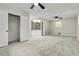 This spacious bedroom features a walk in closet and three ceiling fans at 339 Diane Se Dr, Smyrna, GA 30082