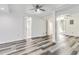 Spacious bedroom featuring ceiling fan and stylish gray wood flooring at 339 Diane Se Dr, Smyrna, GA 30082