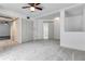 Bright bedroom features plush carpet, closet, and ceiling fan at 339 Diane Se Dr, Smyrna, GA 30082