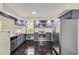 Modern kitchen featuring stainless steel appliances, updated cabinets, and sleek countertops at 339 Diane Se Dr, Smyrna, GA 30082