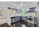 Updated kitchen showcasing stainless steel appliances, stylish cabinets, and a functional layout at 339 Diane Se Dr, Smyrna, GA 30082